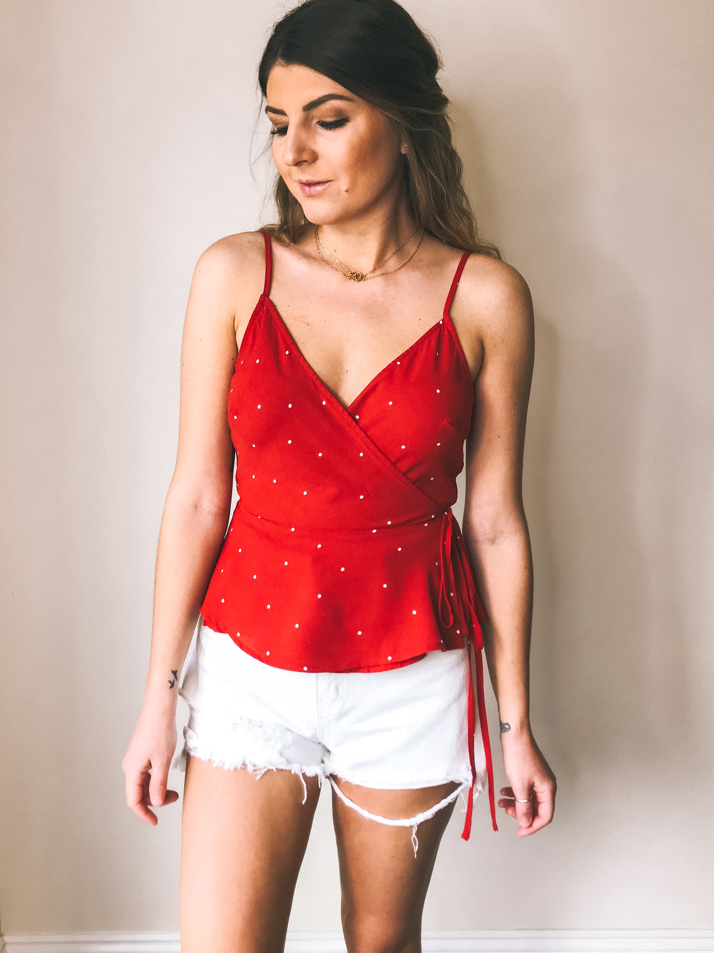 red polka dot wrap top